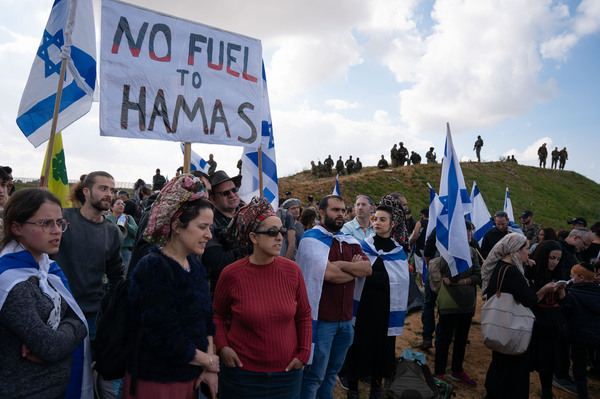 Protesters argue the militant group Hamas diverts humanitarian aid and instead of helping civilians it helps to fuel the war.