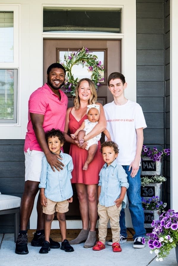 A family poses for a photo