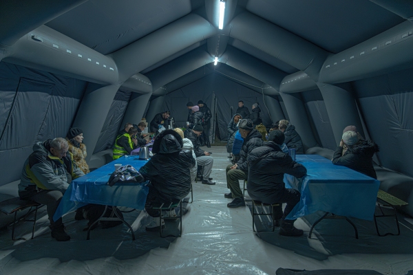 Victims of strike of Russian kamikaze drone Shahed in Sumy in the rescue tent waiting for assistance. 9 apartments completely destroyed, 11 persons killed, 14 injured on 30 Jan 2025 Images: @shtukaanton - Anton Shtuka/NPR