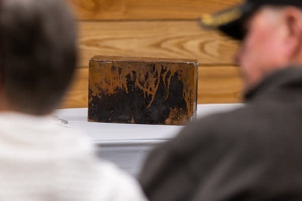 A time capsule sits on a table