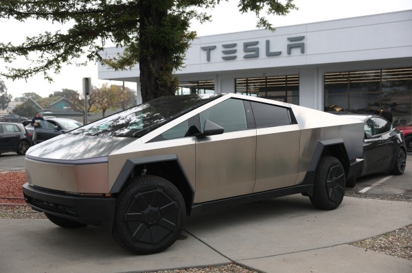 A Tesla Cybertruck at a Tesla dealership on Dec. 20, 2024 in Corte Madera, Calif. A State Department procurement document suggested the Trump administration planned to buy $400 million worth of Tesla vehicles to transport diplomats. The administration now says no such purchase is planned.