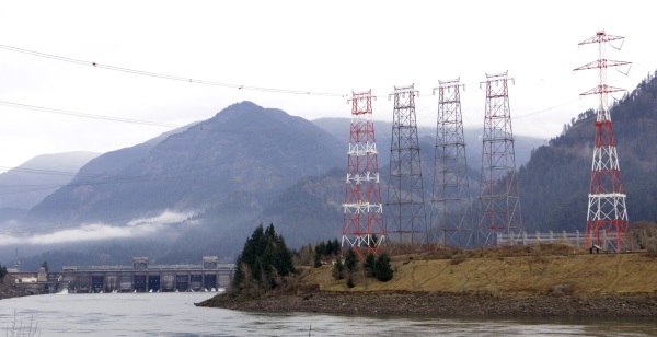 Power lines from Bonneville Dam head cross the Columbia River in North Bonneville, Wash.