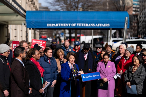 Lawmakers speak at a rally outside the Department of Veterans Affairs headquarters in Washington, DC. 