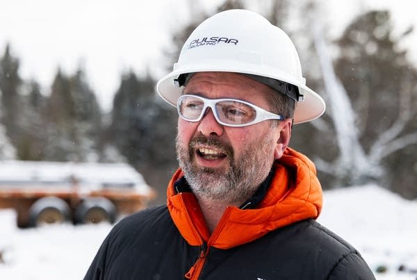 portrait of a man with a helmet and safety glasses