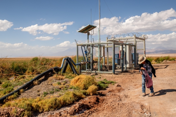 Sara Plaza (72) member of the indiginous community of Peine, walks near a water extraction well in Tilopozo, a former wetland, that according to Peine inhabitants, dried because of the water extraction by Lithium companies. Saturday 13th of April, 2024. Antofagasta, Chile.