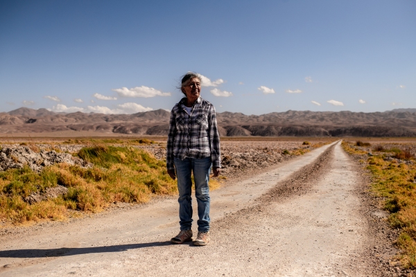 Sara Plaza (72) member of the indiginous community of Peine, stands in Tilopozo, a former wetland, that according to Peine inhabitants, dried because of the water extraction by Lithium companies. Saturday 13th of April, 2024. Antofagasta, Chile.