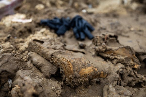 A book encased in mud