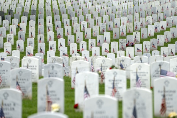 Graves with flags for Memorial Day are seen in Section 60 of Arlington National Cemetery, in Arlington, Va., on May 27, 2024.