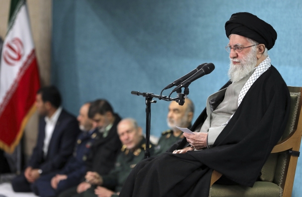 In this photo released by an official website of the office of the Iranian supreme leader, Supreme Leader Ayatollah Ali Khamenei speaks in a ceremony meeting a group of officials, in Tehran, Iran, Saturday, March 8, 2025. (Office of the Iranian Supreme Leader via AP)