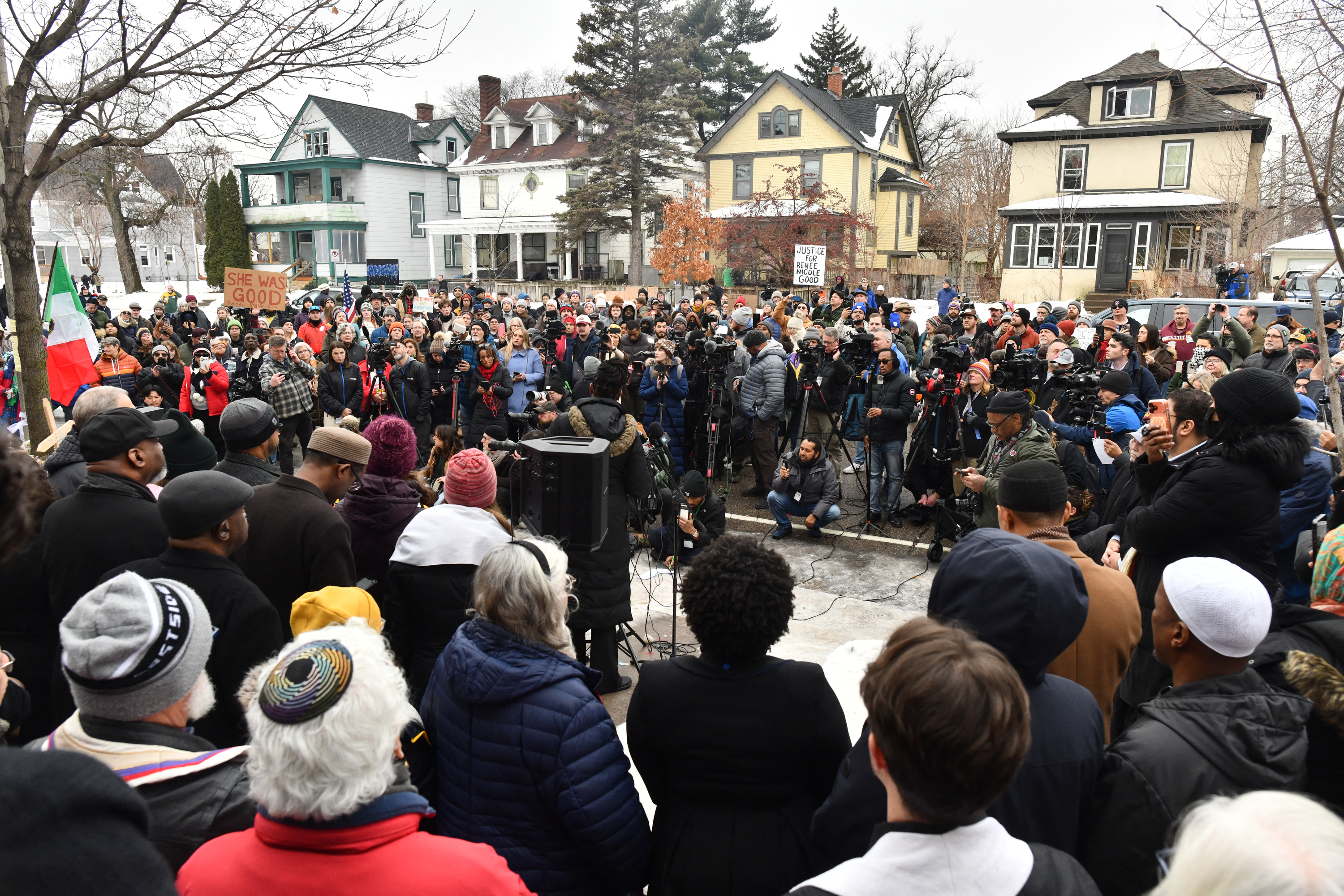 A crowd of demonstrators at the site of Good’s killing.