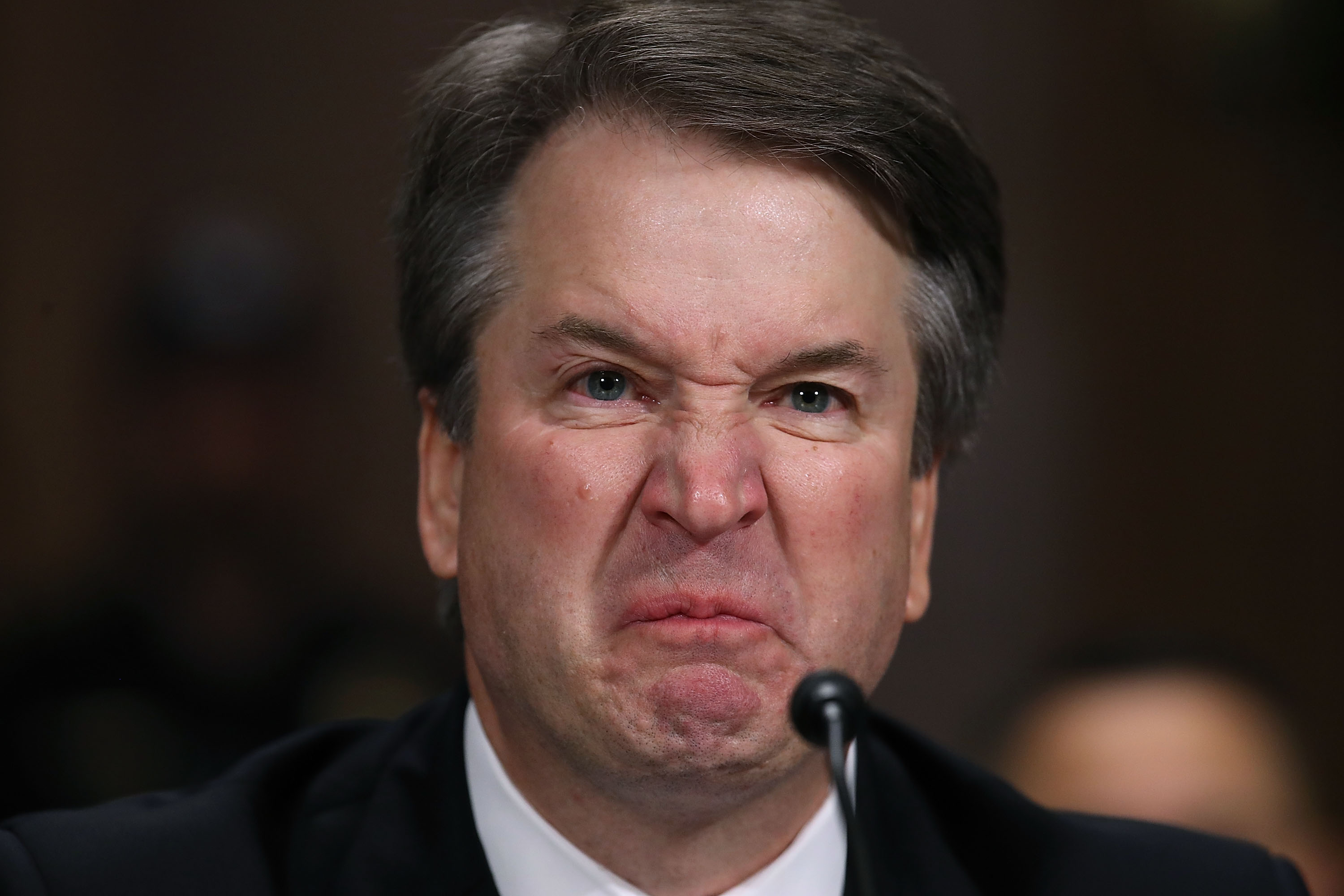 Justice Brett Kavanaugh makes a strange face, at his confirmation hearing in 2018.