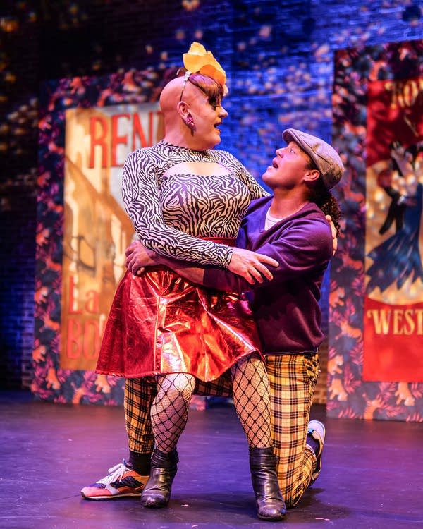 Two performers on stage.