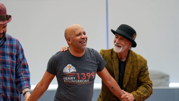 Two actors rehearse.