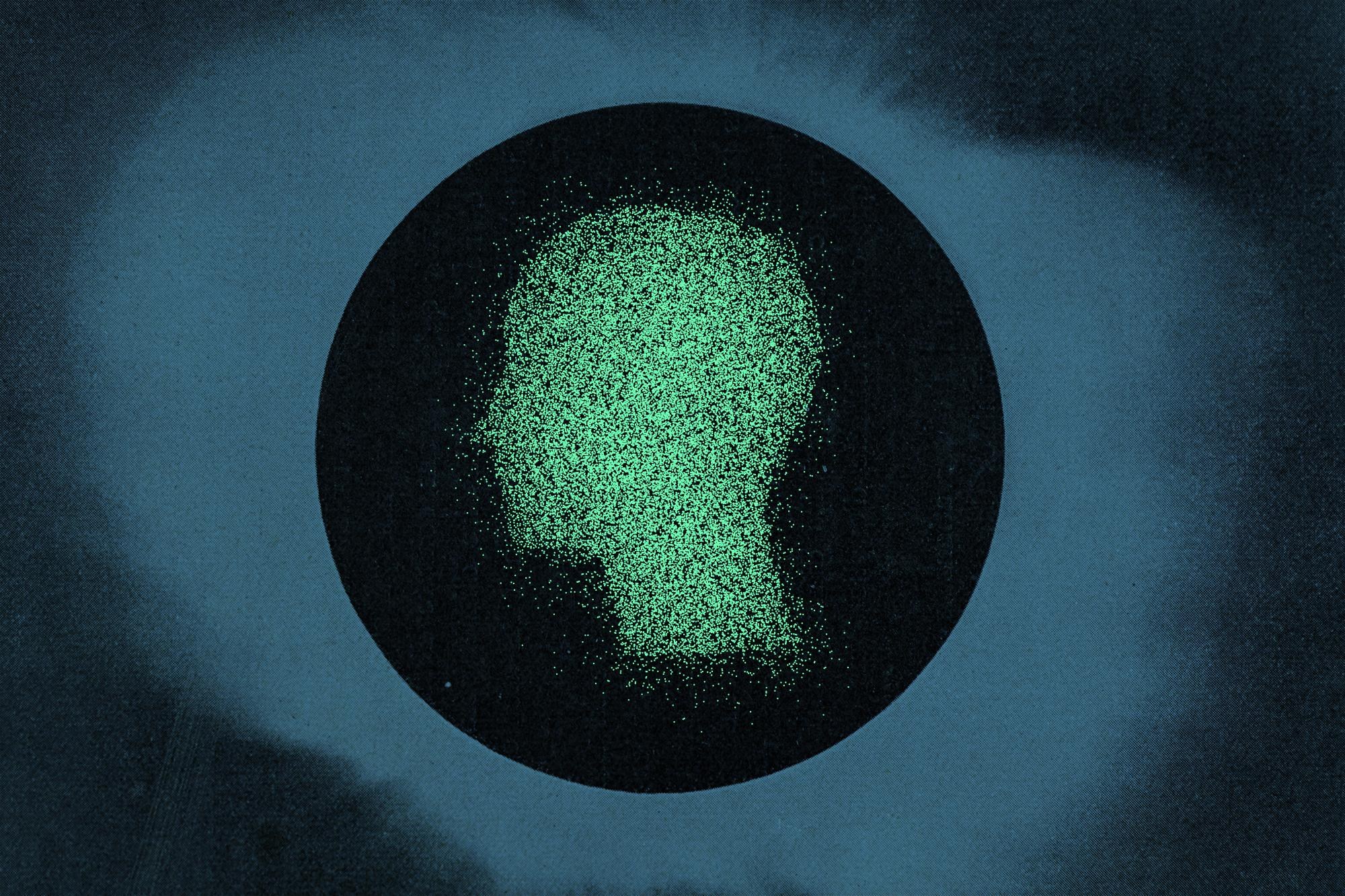 a person’s silhouette is formed by clustered green dots. an image of a solar eclipse in black and blue is just behind it.