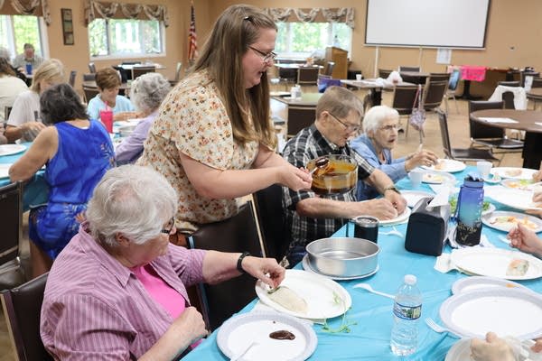 People participating in a cooking demonstration