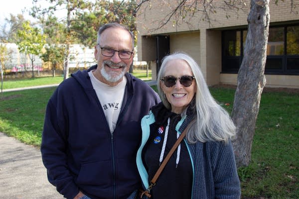 Two people pose for a photo