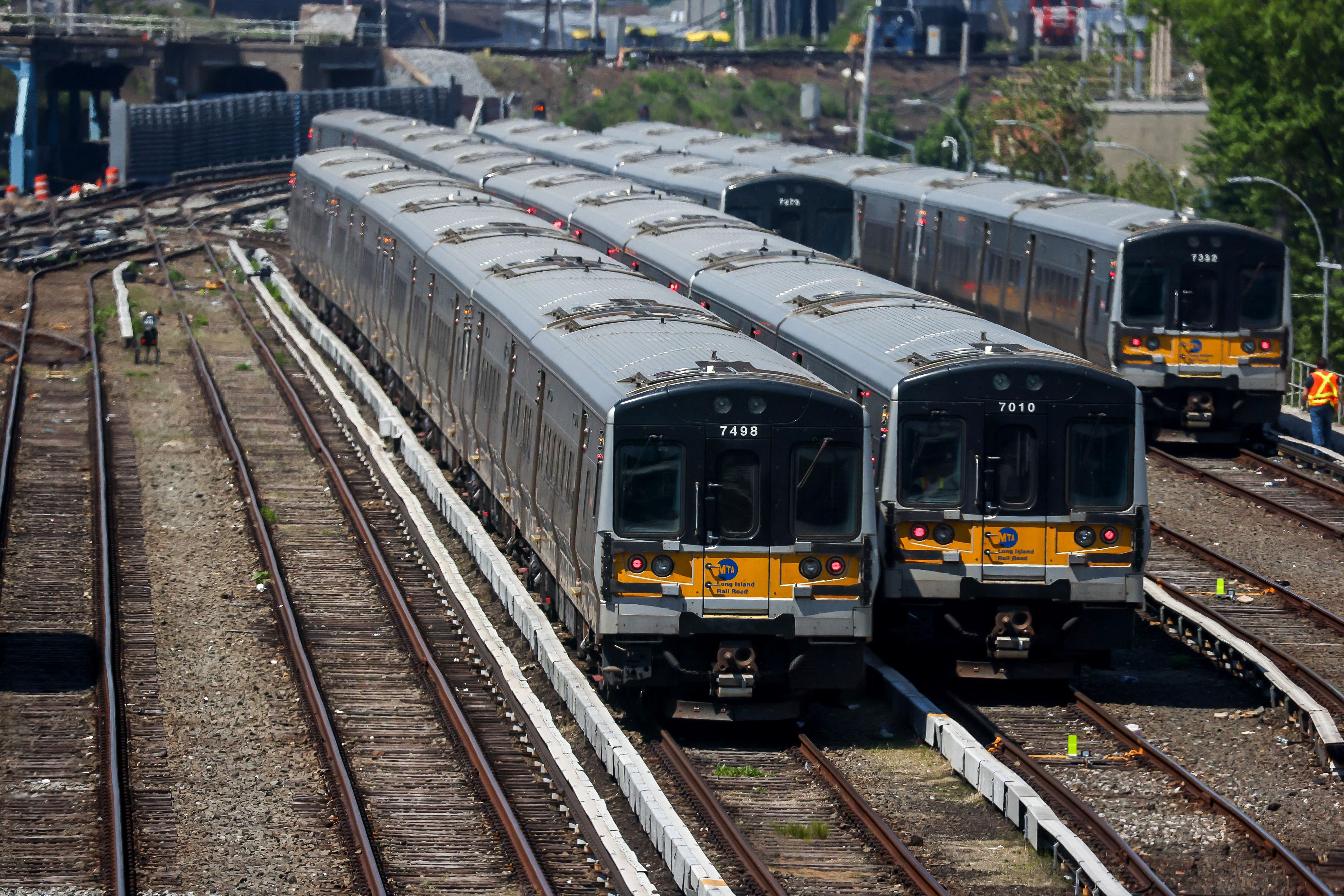 Long Island Railroad trains sit at its station