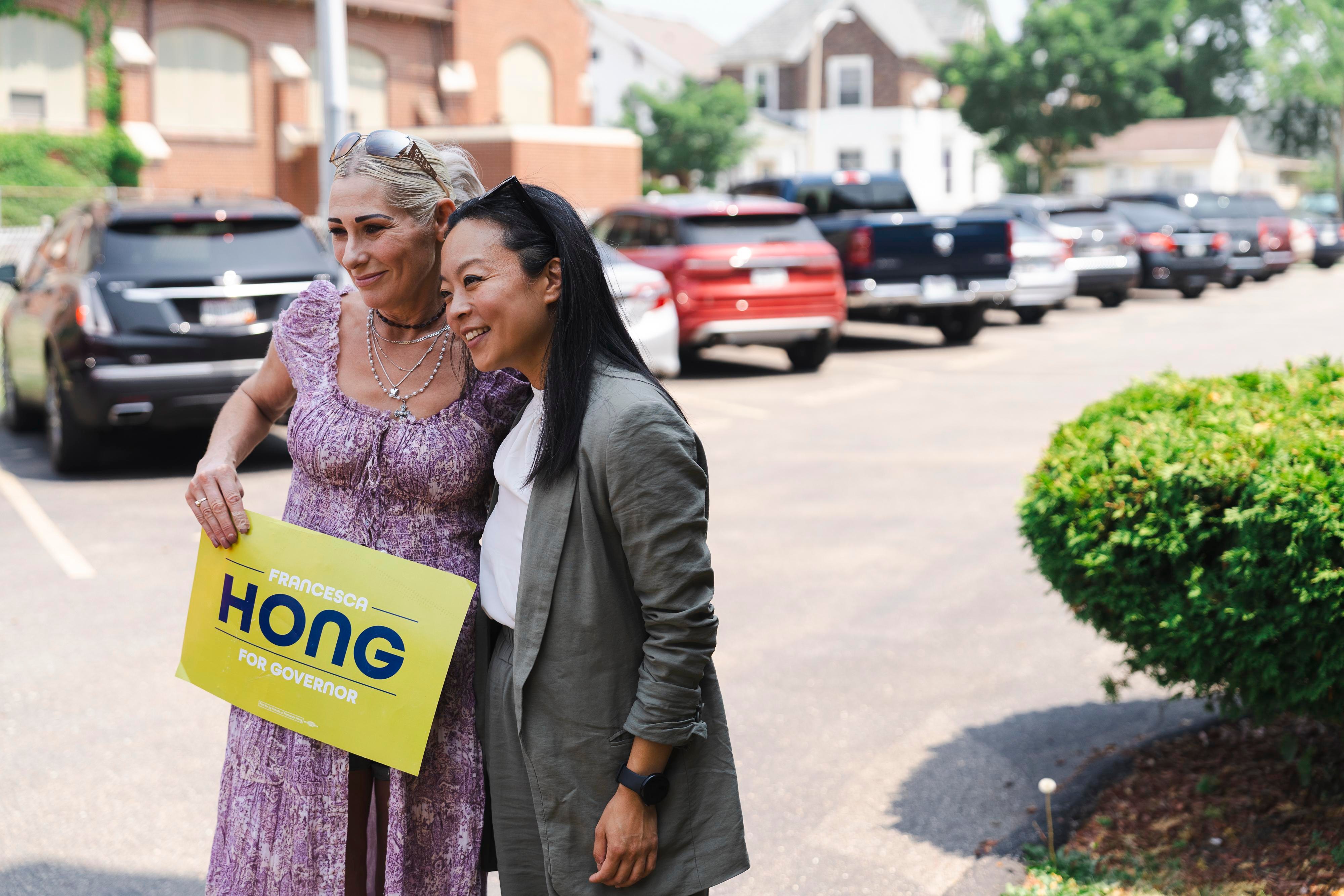 Francesca Hong poses with a supporter.
